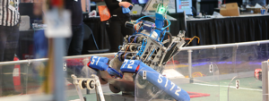 An FRC Robot crossing the field during game play.